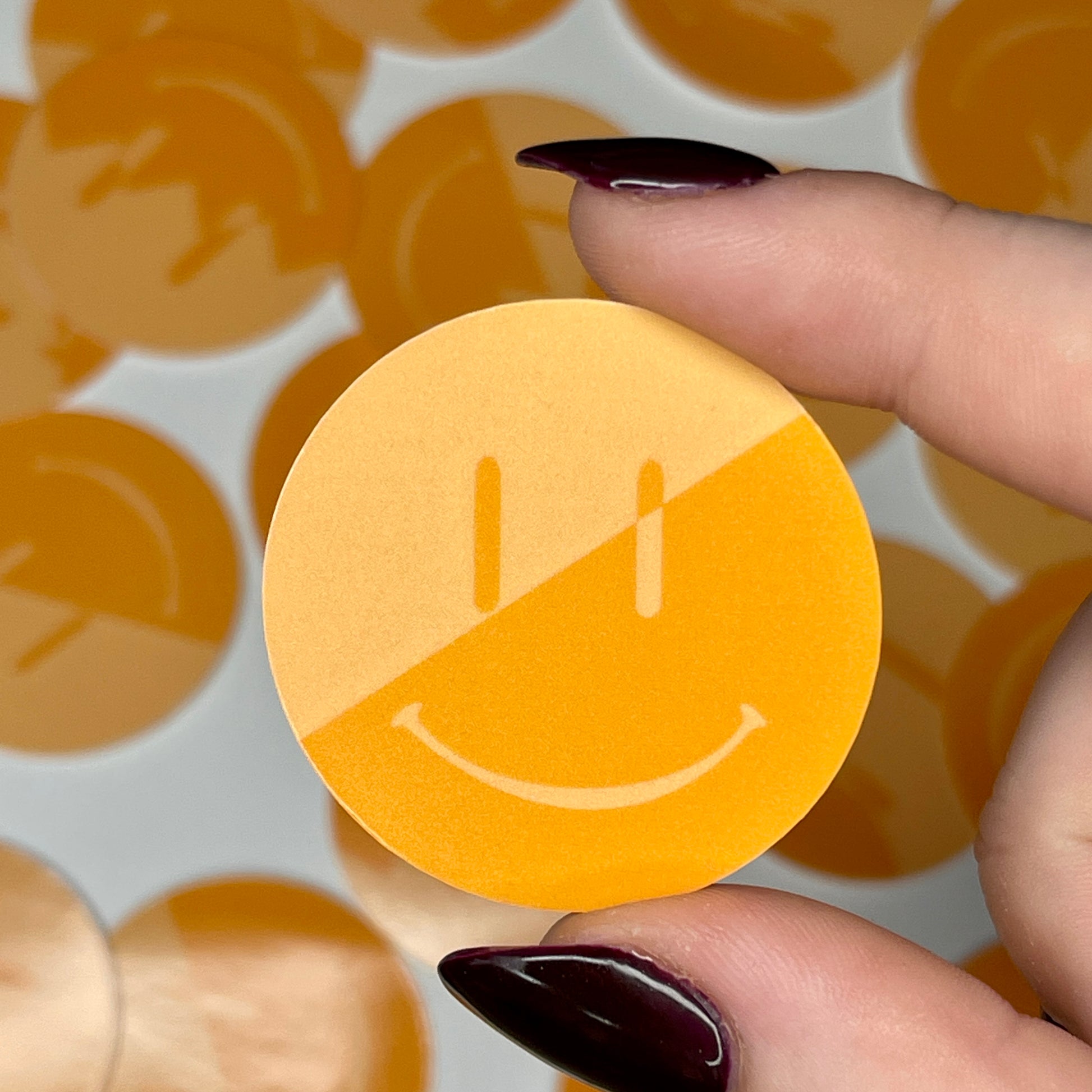 Orange Split Smiley - Glossy Vinyl Sticker