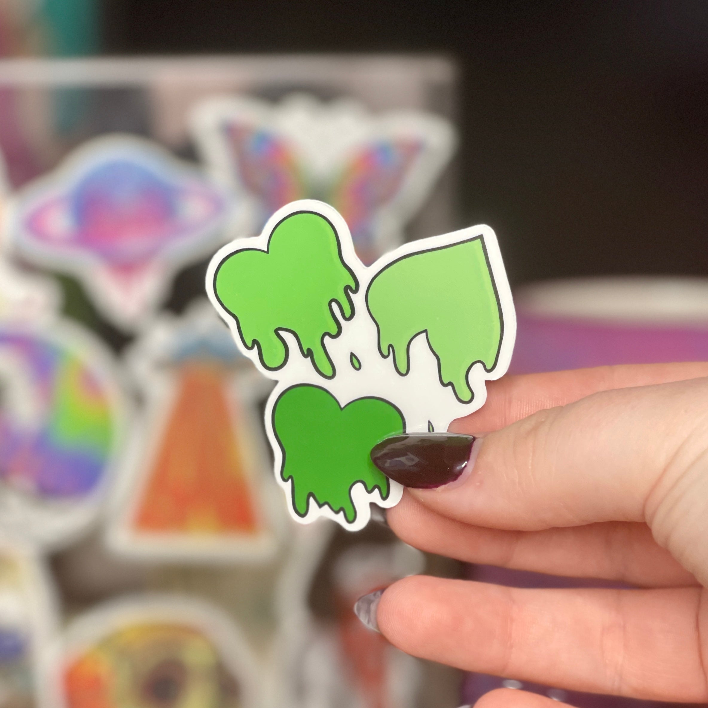 Green Love Spills Here - Glossy Vinyl Sticker